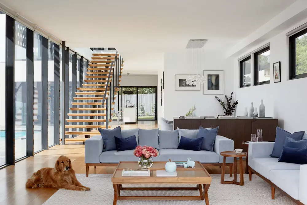 Cantilevered floating staircase in minimalist interior